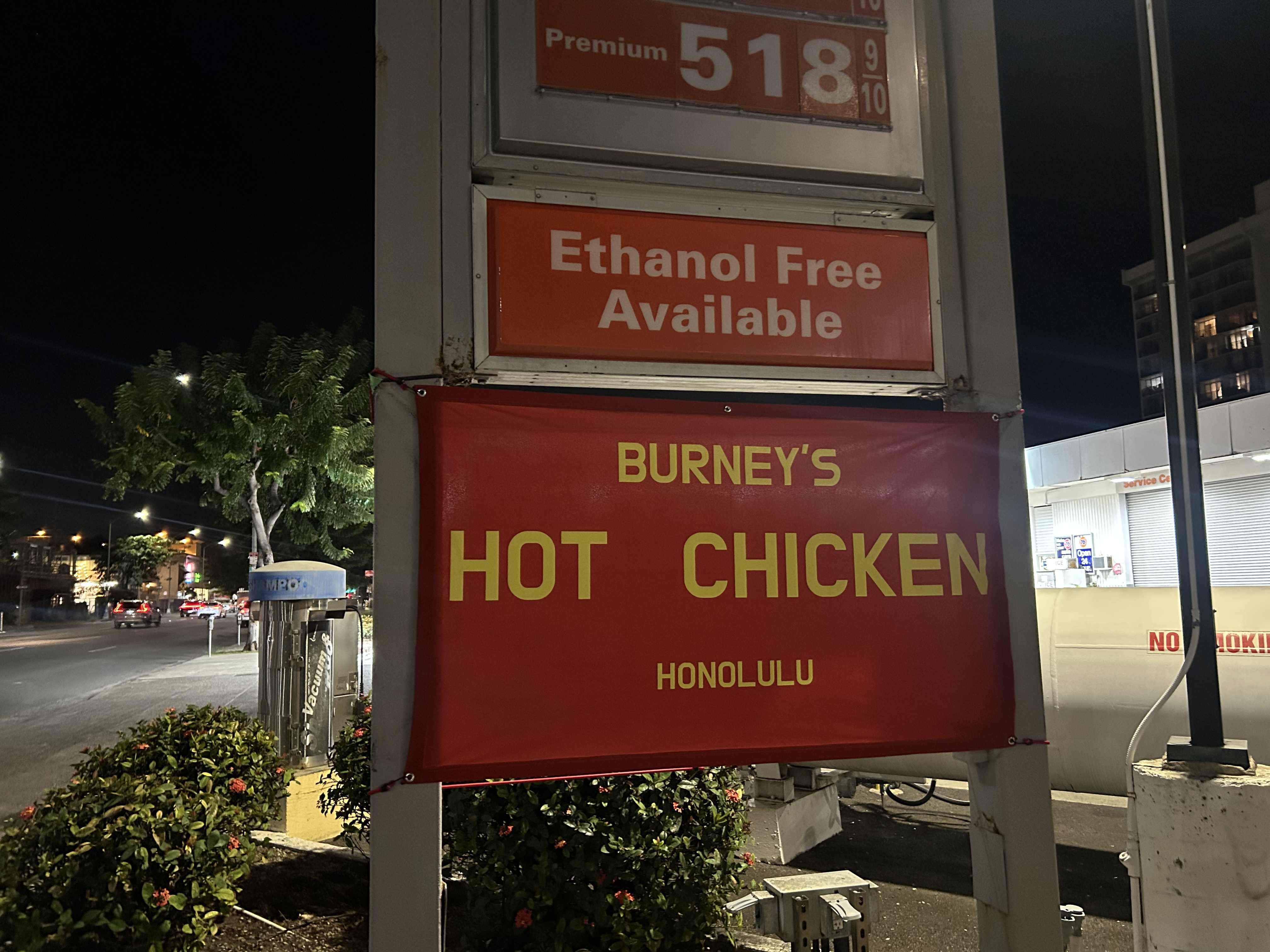 Burney's Hot Chicken stand and flag at the market